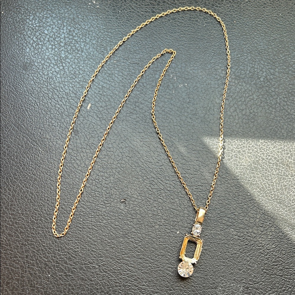 Elegant Gold and Silver Pendant Necklace
